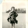 Belva Nelson on rock in front of Point Cabin late 1930s