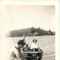 Belva Nelson in the back of the boat and Catherine McDermott in the boat.
