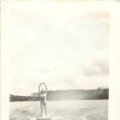 Belva Nelson on surf board