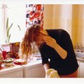 Norma doing hair Centerville, Germany, 1972
