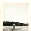Belva Nelson on surfboard