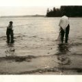 Getting minnows on beach Nelsons Resort 1930s
