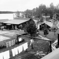 Picture taken early spring from roof of ice house of store, garden, teeny and oil house