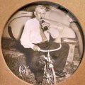Enrico Pirri on Tricycle drinking beer